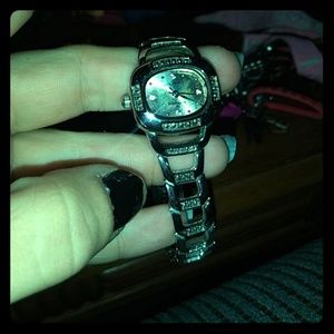 Bracelet,watch,and another beautiful pink bracelet